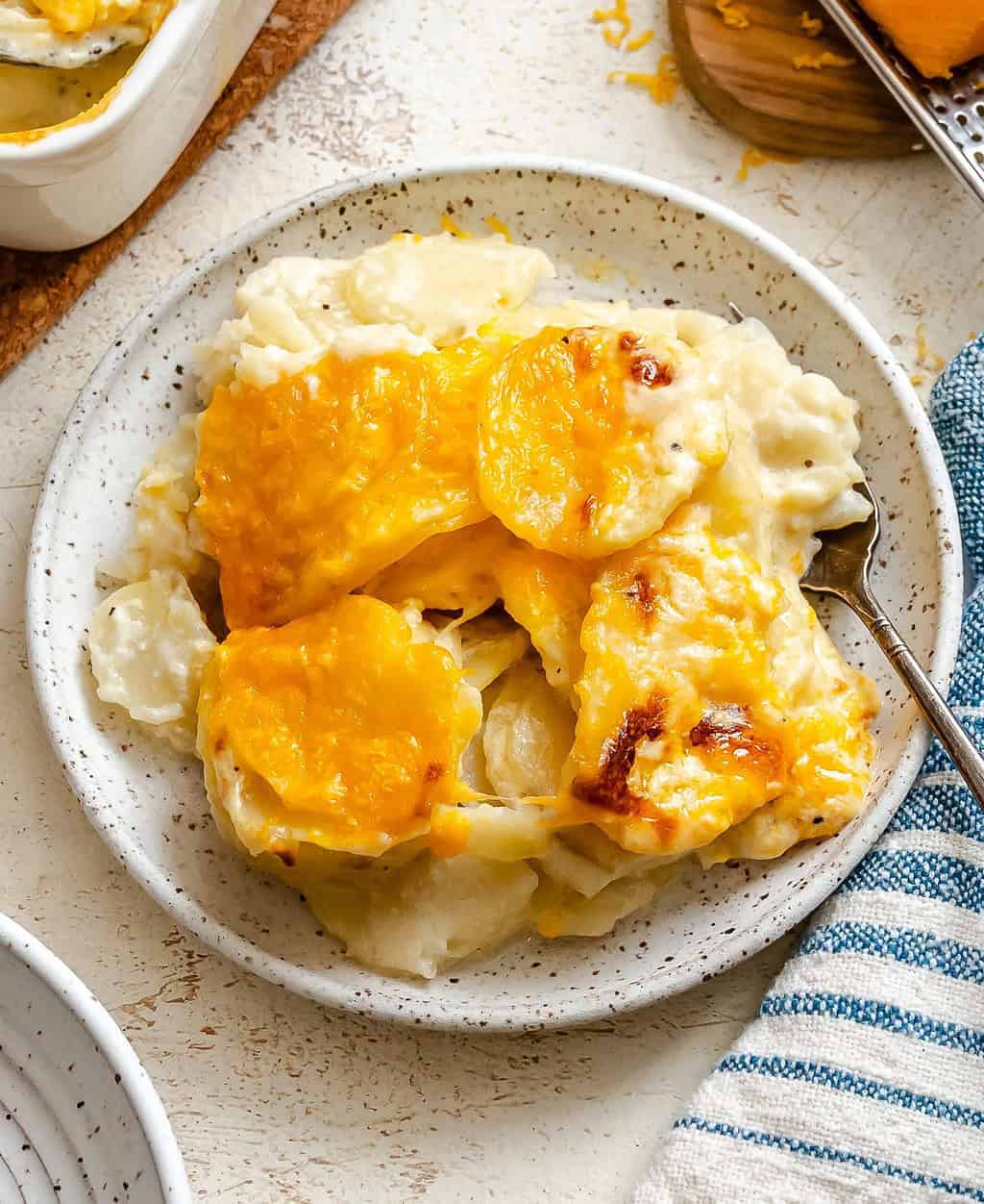 A plateful of creamy scalloped potatoes for classic comfort food.