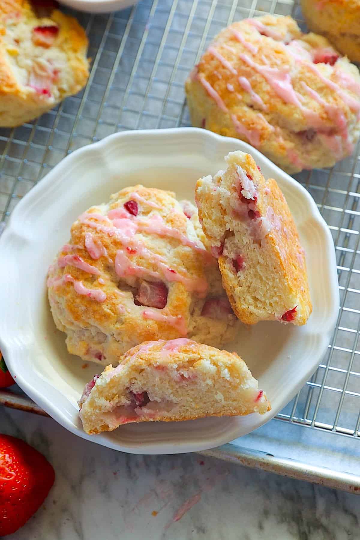 Slicing into a decadent Strawberry Biscuits for breakfast