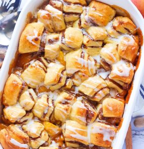 Glazed Cinnamon Roll Peach Cobbler for the ultimate comfort food dessert