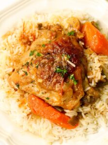 Serving Braised Chicken Thighs with rice and vegetables
