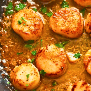 How to Make Pan-Seared Scallops. oat scallops in the flavorful sauce. Serve immediately for a mouthwatering experience.