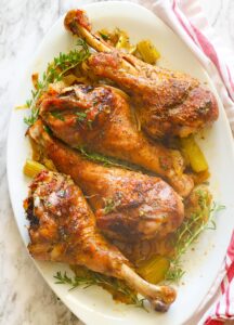 Tender, moist, and super easy Roast Turkey Legs on a white platter