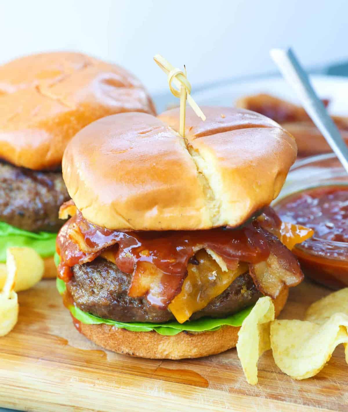 Grill up a delicious bacon burger from Feed the Grill for your next Super Bowl