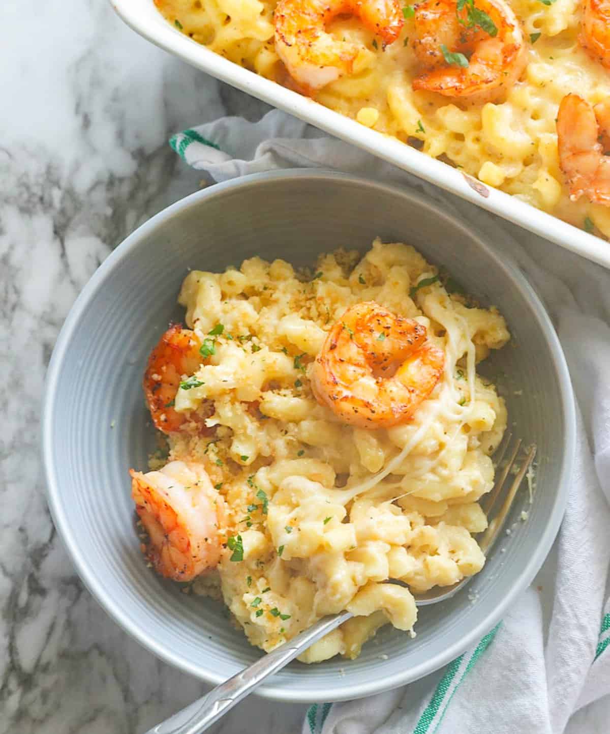 Decadent and cheesy shrimp mac and cheese for an elegant yet fast weeknight dinner