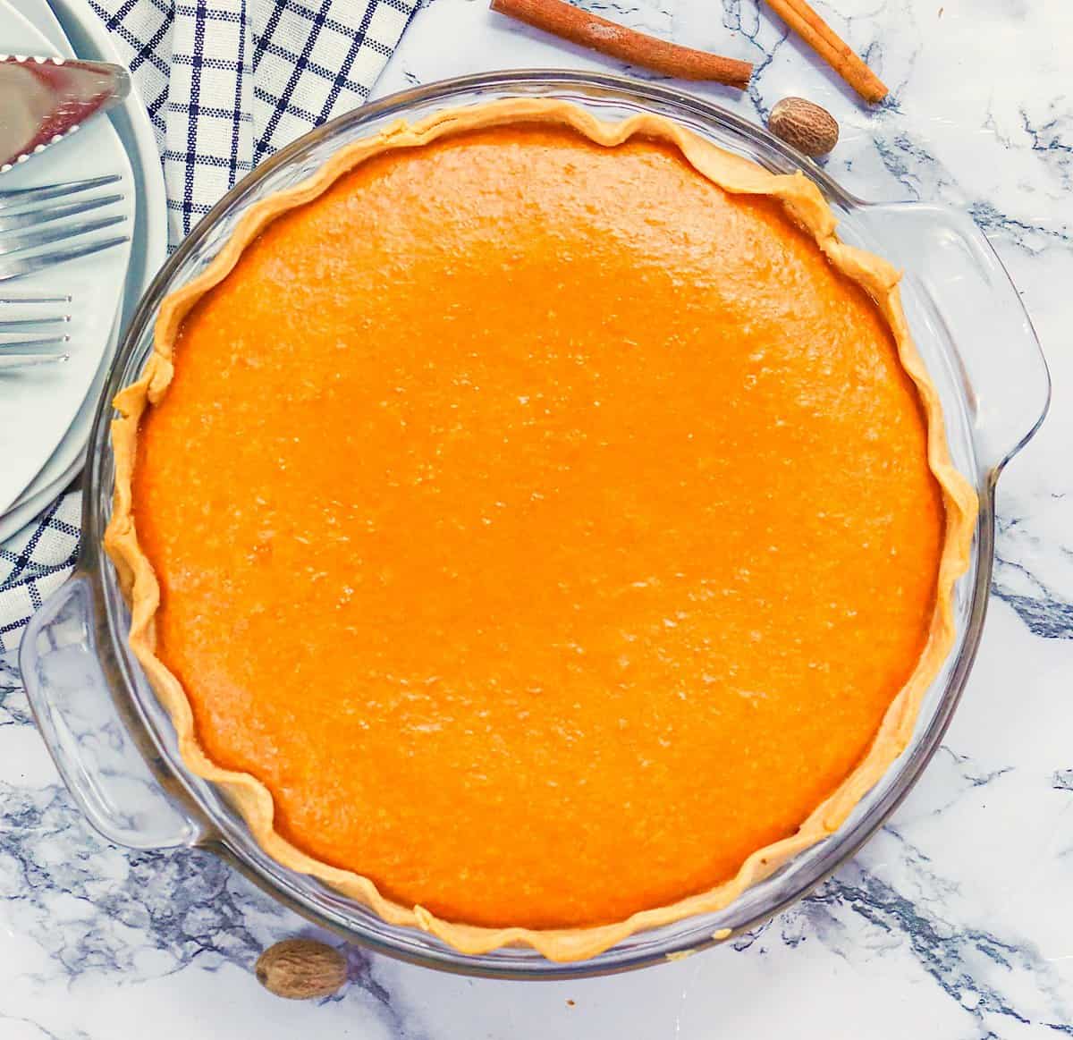 Freshly baked Condensed Milk Sweet Potato Pie cooling for the holidays