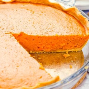 A freshly made Condensed Milk Sweet Potato Pie sliced and ready to serve