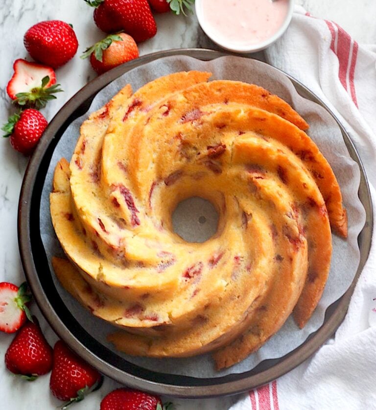 Glazing a gorgeous Strawberry Bundt Cake for pure comfort food