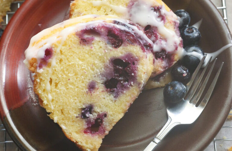 Enjoying a bite of moist, tender blueberry bundt cake