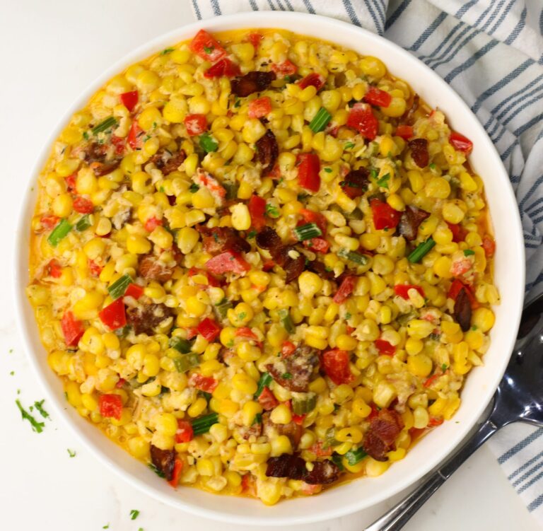 A steaming hot pan of corn maque choux ready to enjoy