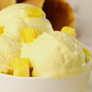 Enjoying a bowl of homemade pineapple ice cream, no ice cream maker involved