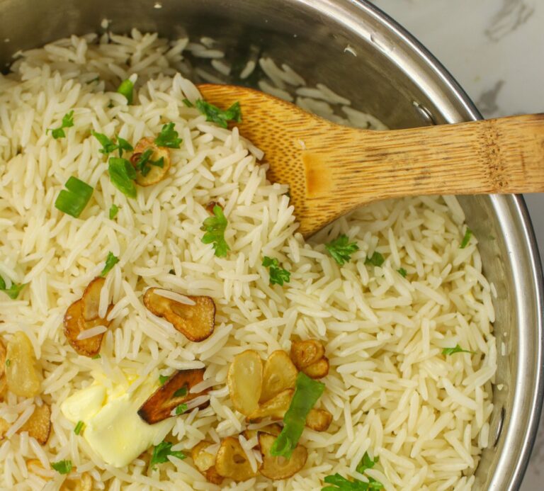 Fresh from the stove garlic rice, fluffed and ready to enjoy
