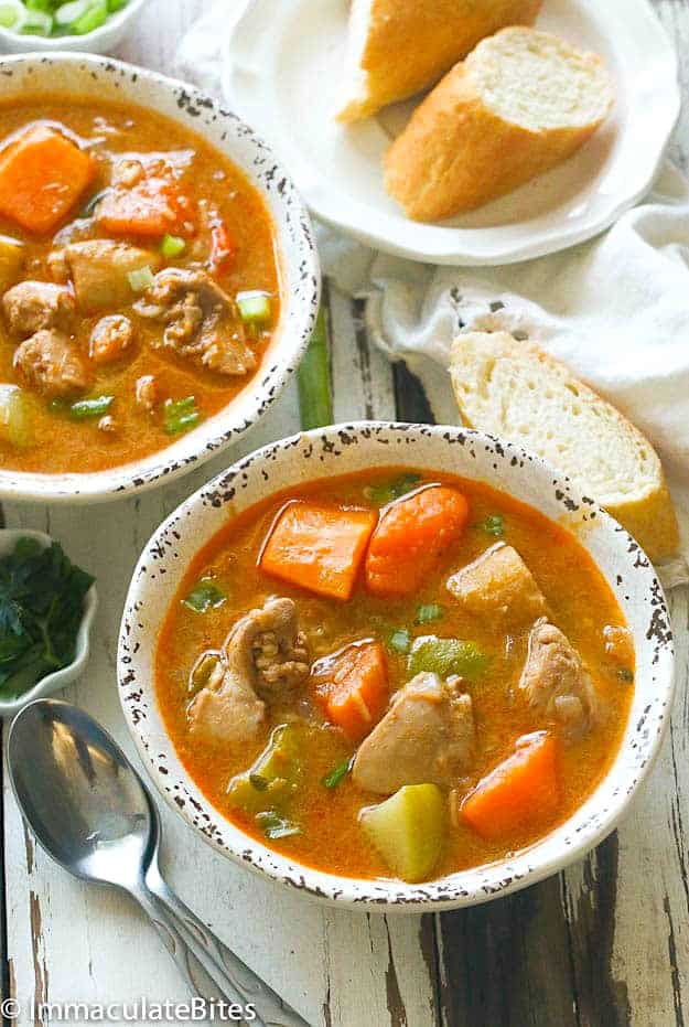 Jamaican chicken and pumpkin soup with homemade bread for soul food deliciousness
