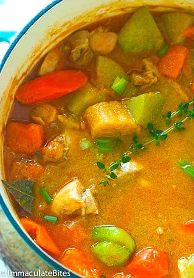 A freshly made pot of Jamaican chicken and pumpkin soup ready to enjoy