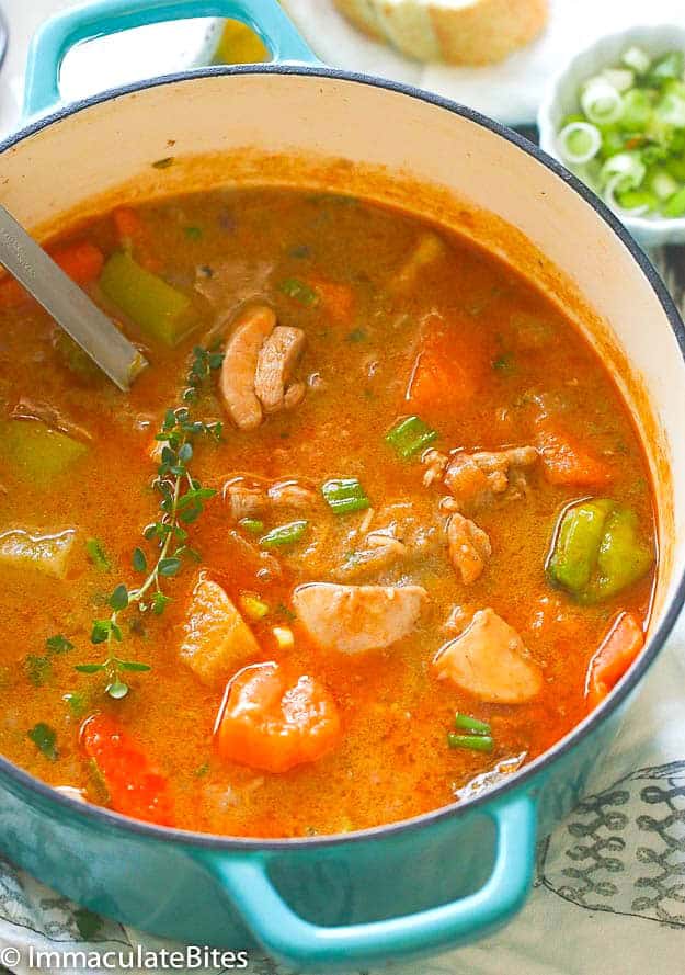 Simmering Jamaican chicken and pumpkin soup and serving it up for comfort food goodness