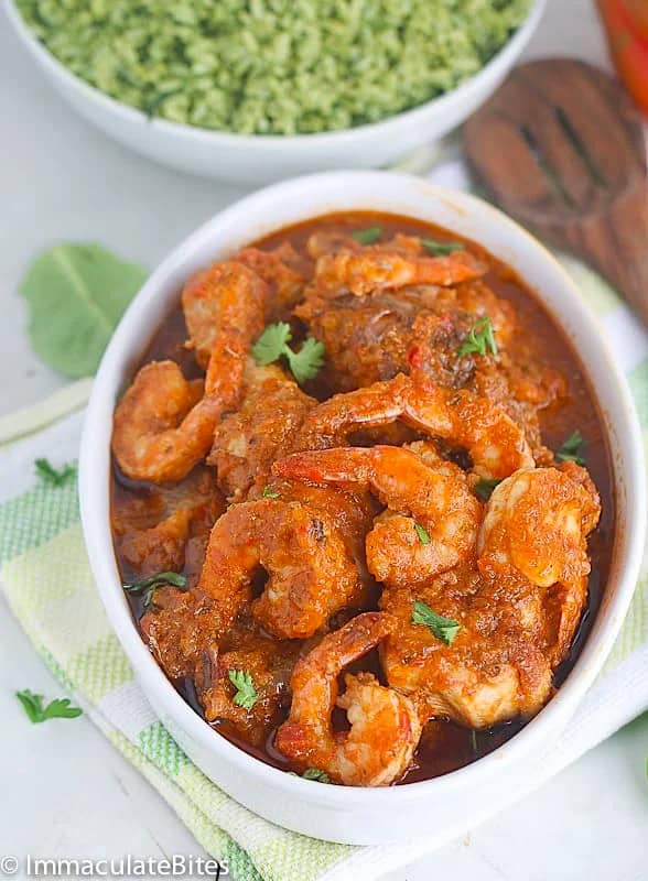 Liberian chicken gravy fresh of the stove in a white serving bowl and ready to enjoy