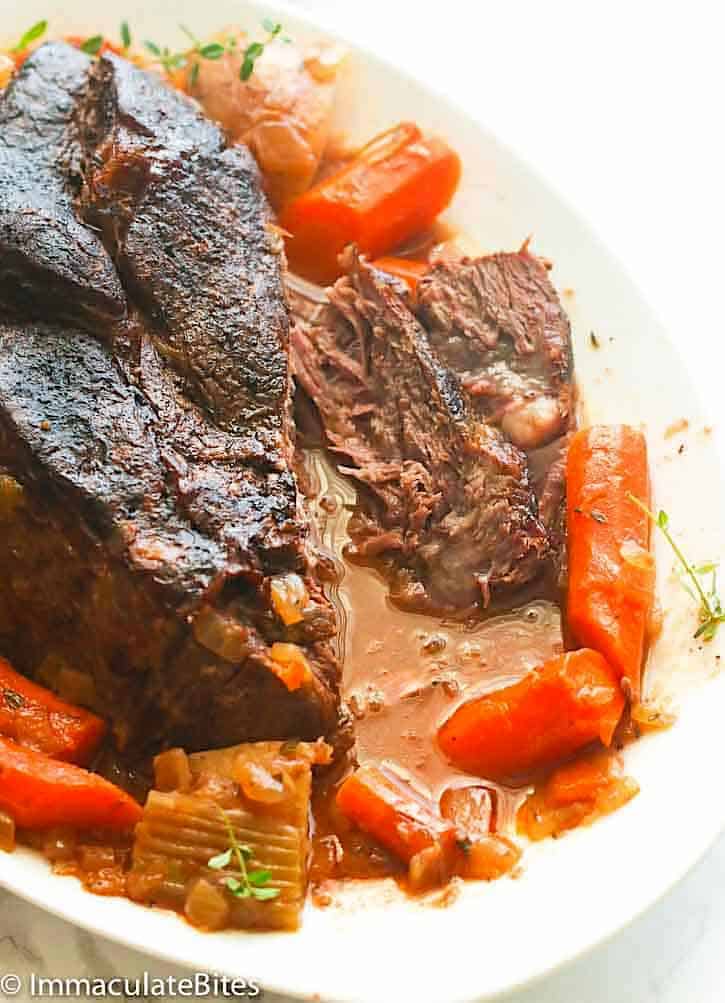 Enjoy a delicious slow cooker pot roast for an easy weeknight dinner.