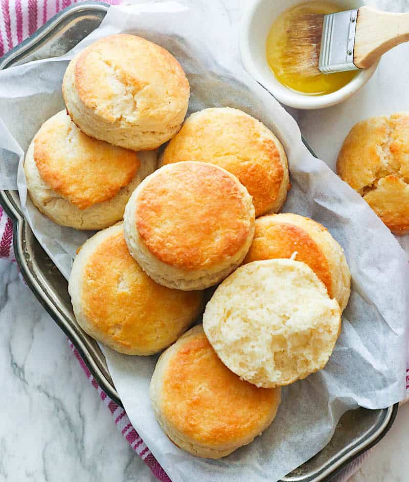 Breaking open freshly baked biscuits.