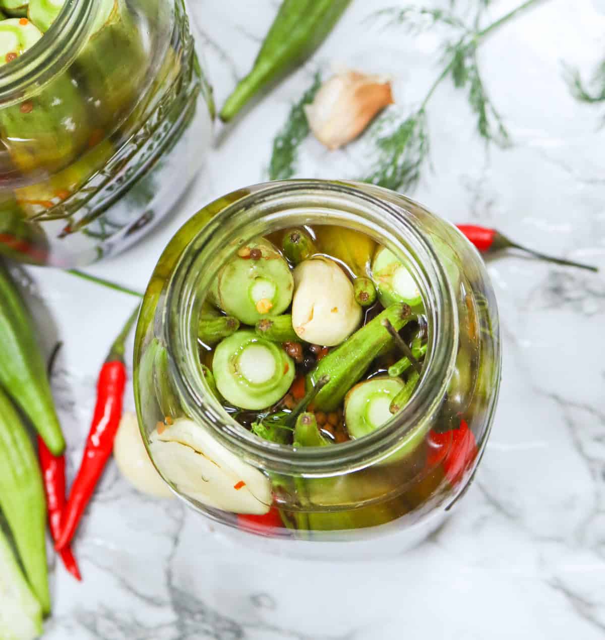 Opening a jar of instant okra pickles