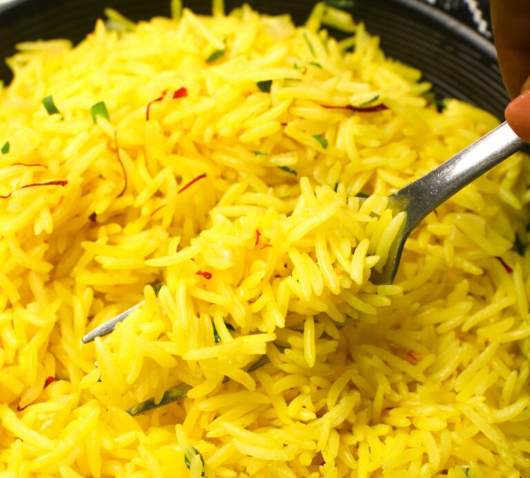 Diving into a gorgeous yellow bowl of saffron rice