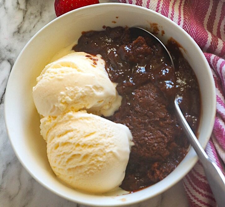 Serving up warm chocolate cobbler with vanilla ice cream