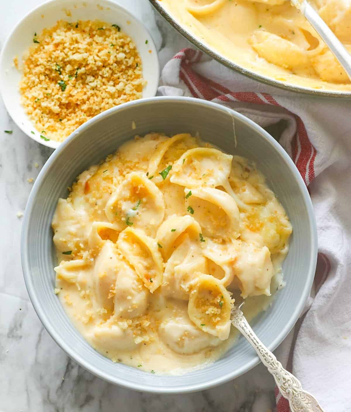 Dive into a bowl of delicious white cheddar mac and cheese