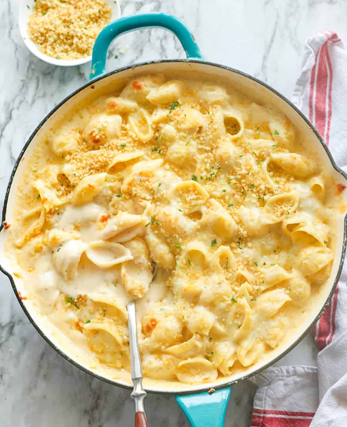 Oven-baked white cheddar mac and cheese with breadcrumb topping