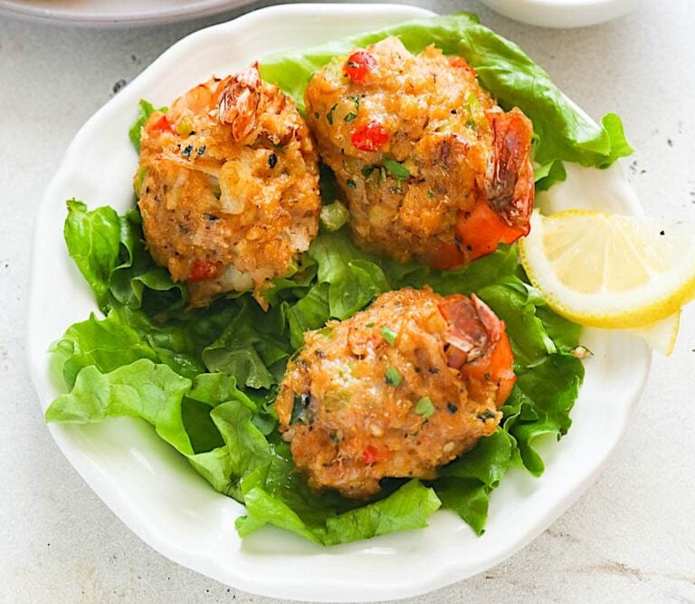 Ready to enjoy crab stuffed shrimp arranged on a bed of lettuce for an impressive appetizer