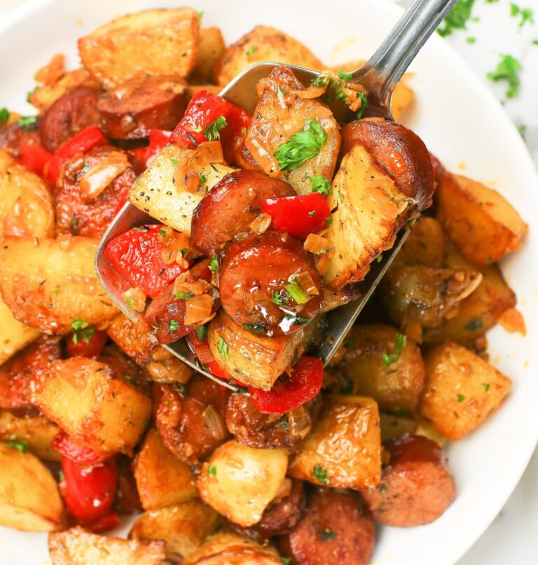 Enjoying sausage and potatoes hot off the stove