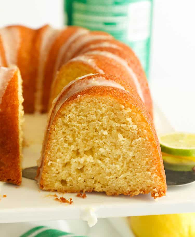 Slicing into a pound cake for Southern comfort on a plate.