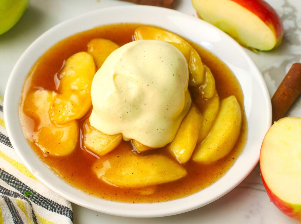 Serving warm fried apples with a scoop of vanilla ice cream for a comfort food dessert