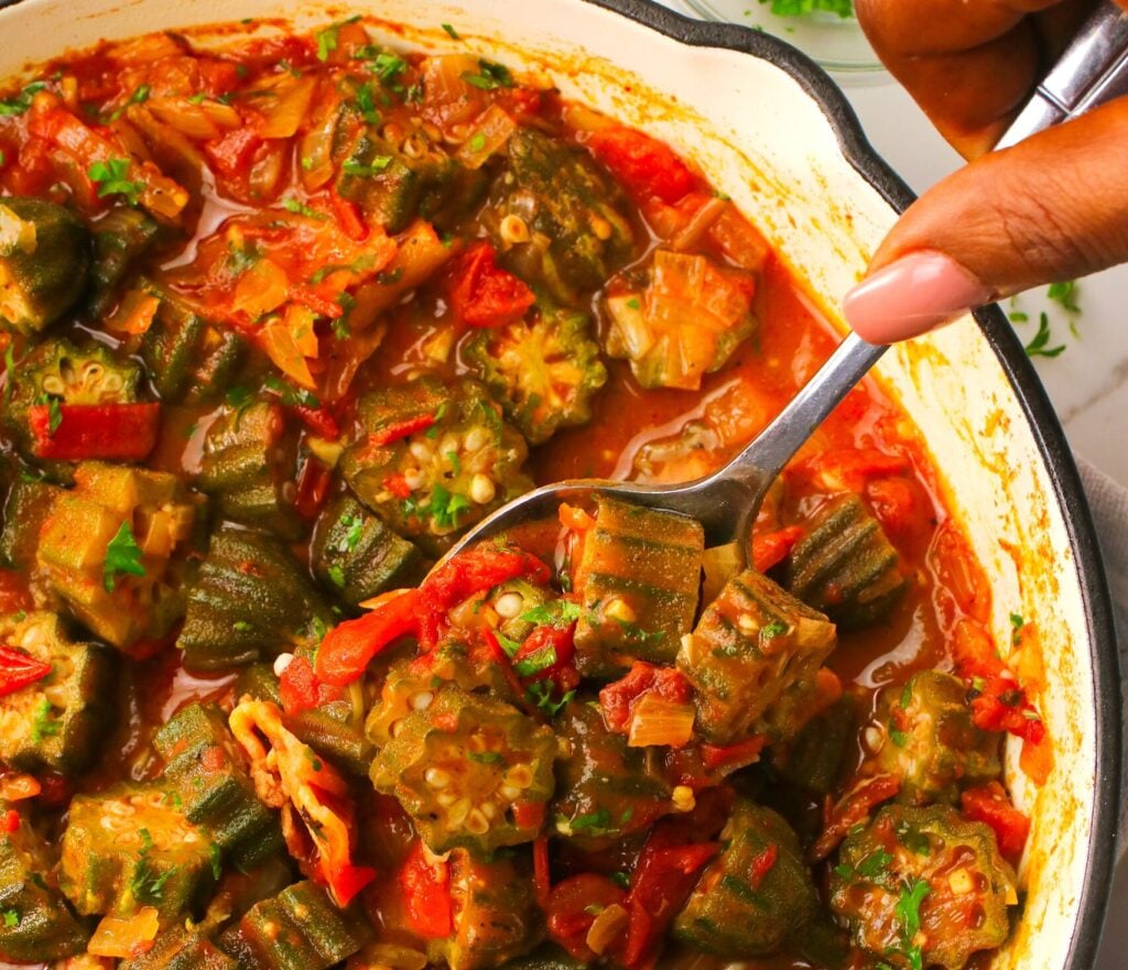 Serving up steaming hot okra and tomato stew