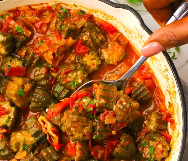 Serving up steaming hot okra and tomato stew