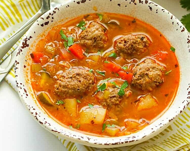 A bowl of amazing albondigas soup hot off the stove