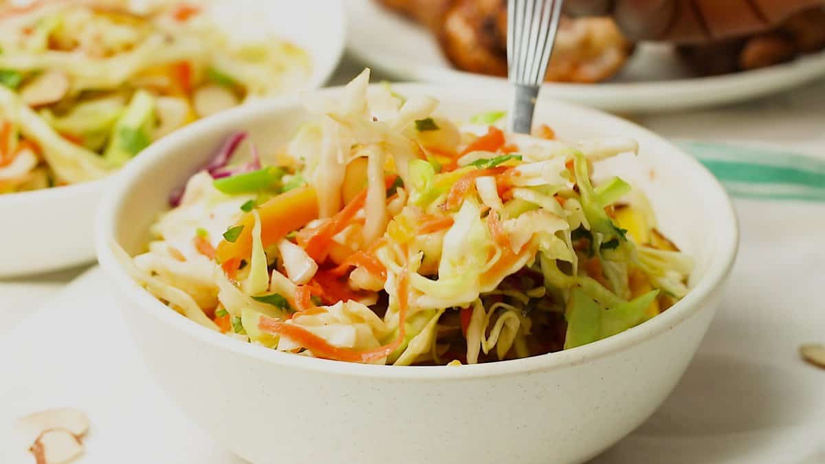 Serving up a chilled bowl of Caribbean coleslaw for amazing comfort food