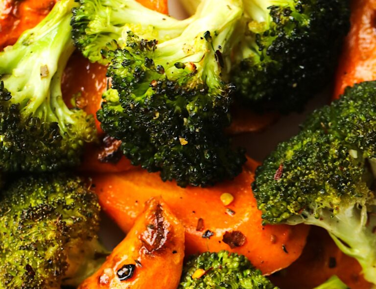 Serving up freshly roasted broccoli and carrots for a quick and easy side dish