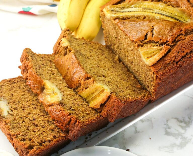 Slicing into fresh brown butter banana bread for an elevated snack