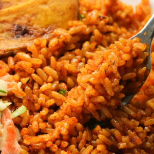 Enjoying a forkful of savory Nigerian jollof rice on a crazy weeknight