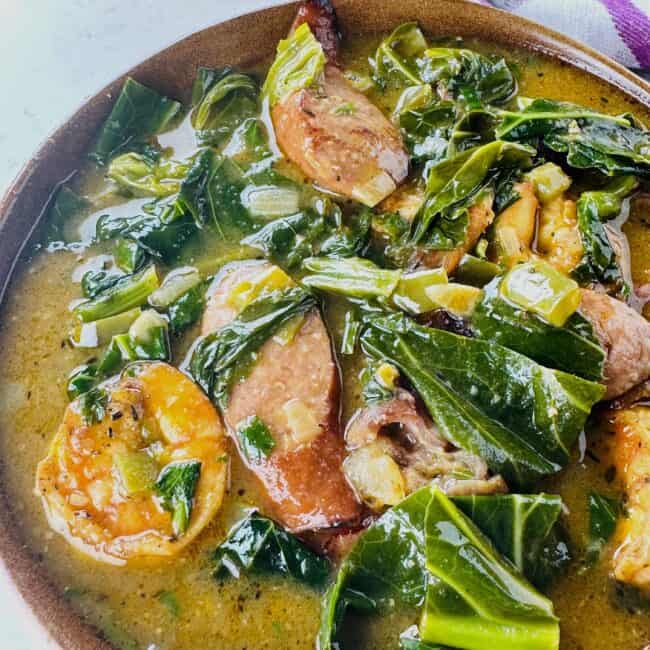 Amazing green gumbo with collard greens, shrimp, and smoked sausage