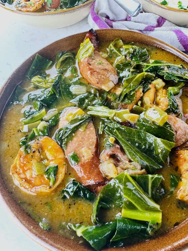 Amazing green gumbo with collard greens, shrimp, and smoked sausage