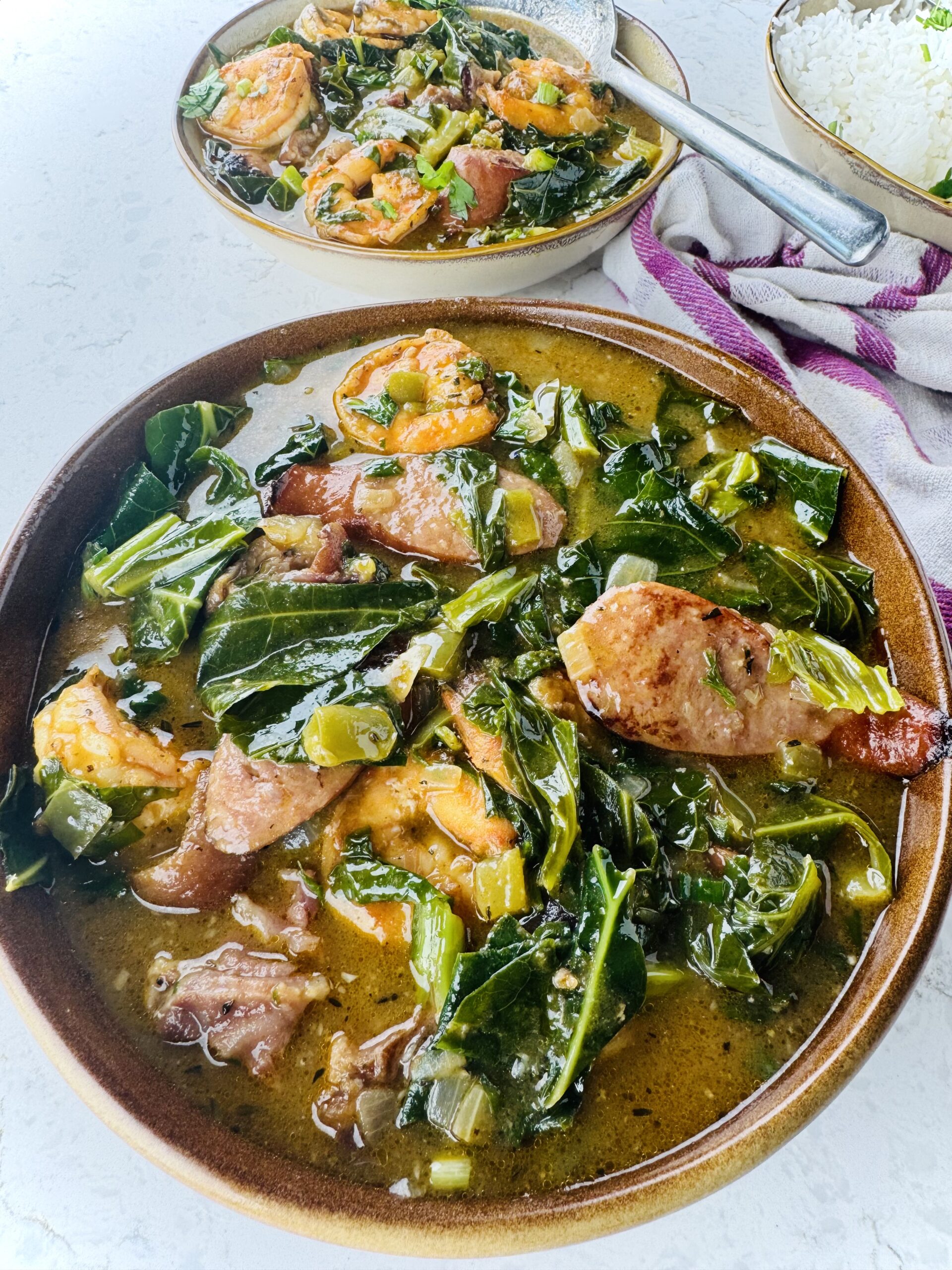 Serving up a delicious bowl of green gumbo with shrimp and sausage for an amazing one-pot meal.