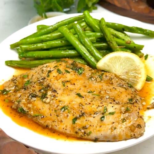 Serving up delicious oven baked tilapia for an easy and healthy weeknight dinner.