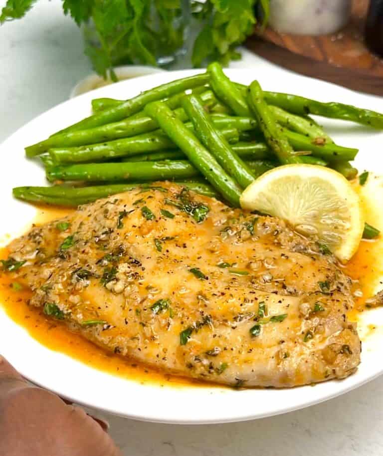 Serving up delicious oven baked tilapia for an easy and healthy weeknight dinner.