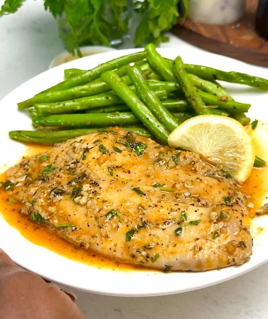 Serving up delicious oven baked tilapia for an easy and healthy weeknight dinner.