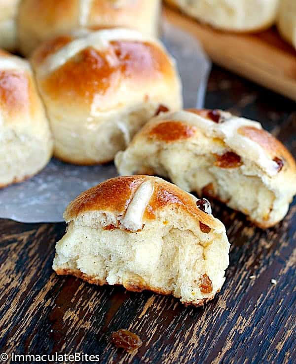 Breaking open an insanely comforting baked hot cross bun