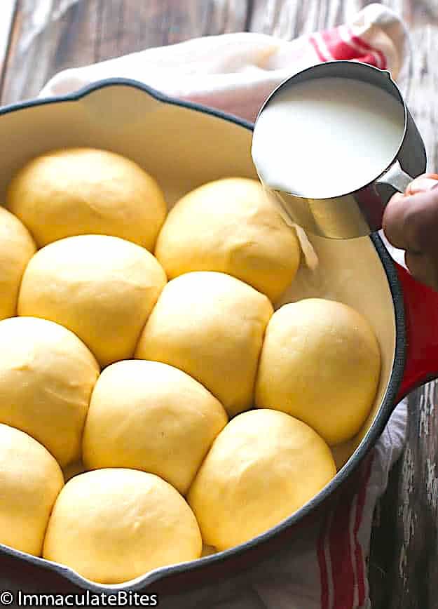 Pour the coconut milk over the rolls for the sauce