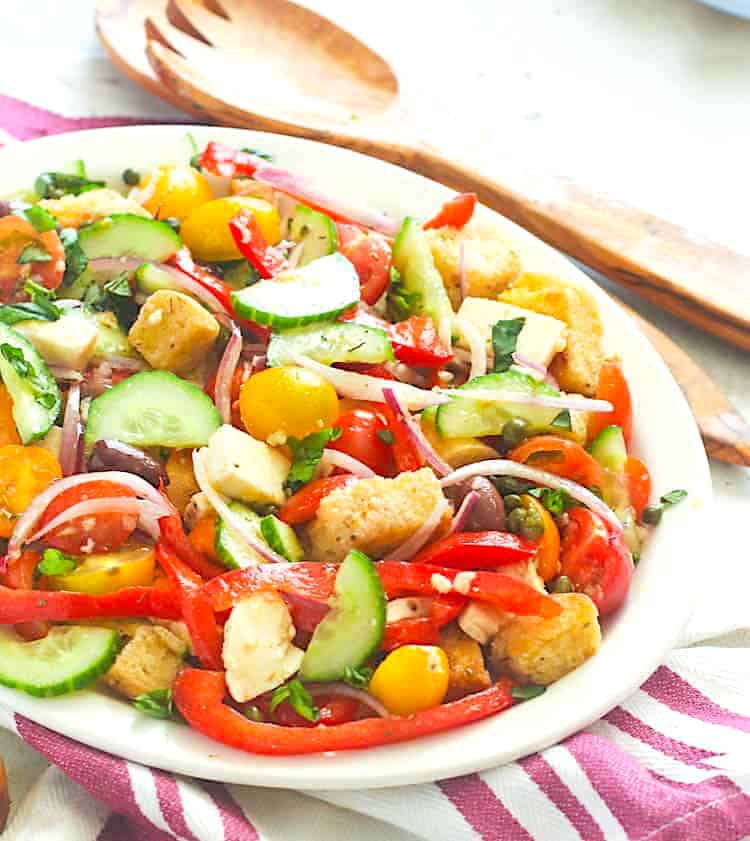 Setting down to a freshly assembled panzanella salad