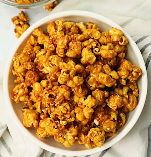 Enjoying homemade caramel popcorn for the perfect movie-night treat.