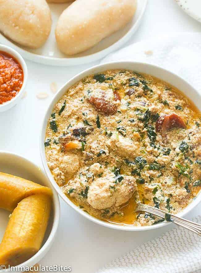 Egusi soup with lumps pairs perfectly with cooked plantains and fufu