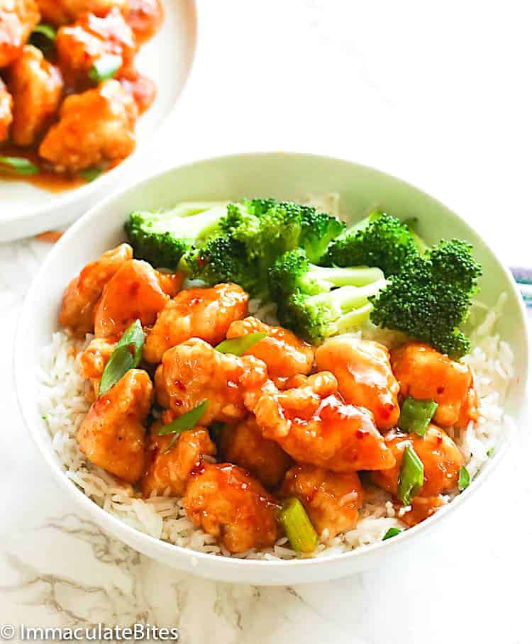 Serving up comfort food orange chicken with rice and broccoli.