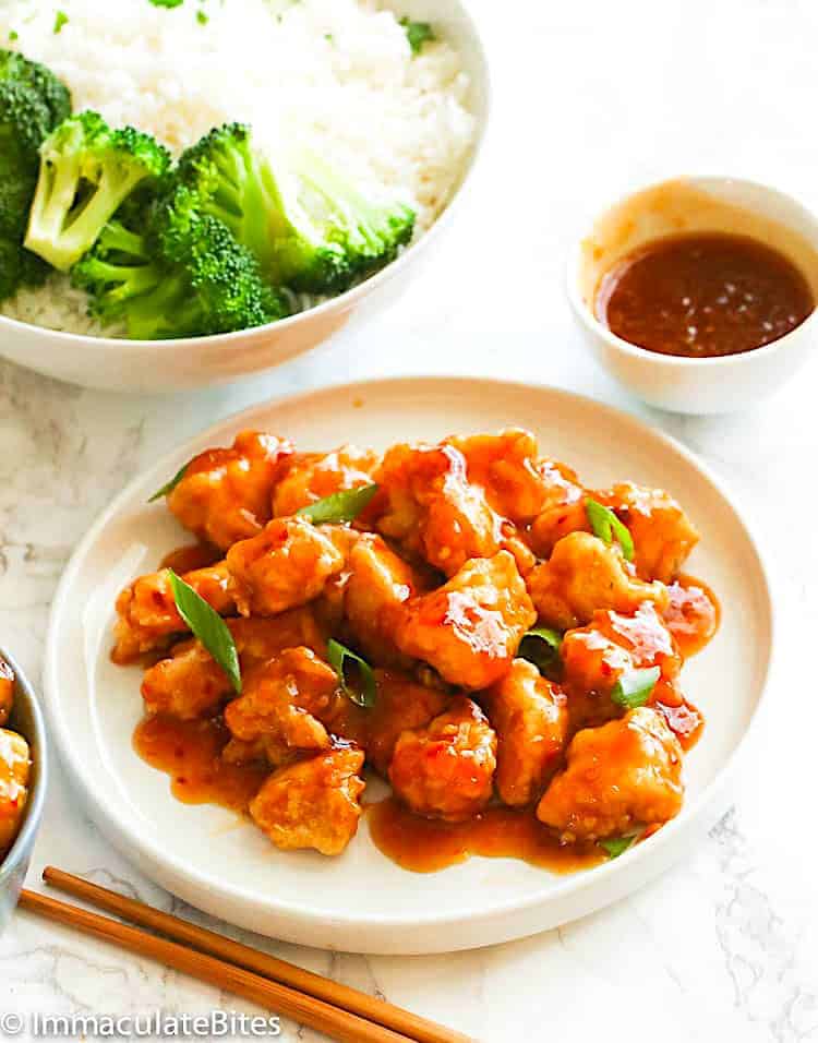 Enjoying Asian-flavored chicken with rice and broccoli.